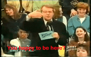 happy to be here jerry springer GIF
