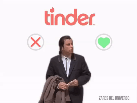 An animated gif that shows a background of Tinder, with the name brand and buttons on either side with the X or checkmark, and then John Travolta standing in between them. He is taken from a clip from Pulp Fiction where he looks back and forth awkwardly, unsure of what to do, but it looks like he can't decide between swiping left or right.