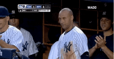 Sports gif. Derek Jeter and Ichiro Suzuki from the New York Yankees. Jeter stares at the outfield, not moving a muscle, until Suzuki comes back to the dugout. His entire face changes into a grin and he whoops, clapping Suzuki on the helmet.