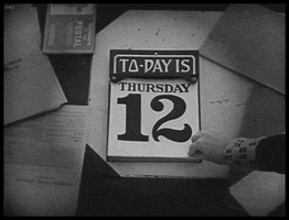Animated graphic gif. Black and white footage of a calendar that reads, "Today is..." with pages being torn off over and over again, changing the date from Thursday the 12th to Friday the 13th back to Thursday the 12th in a continuous loop.