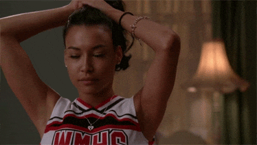 Santana putting her hair up