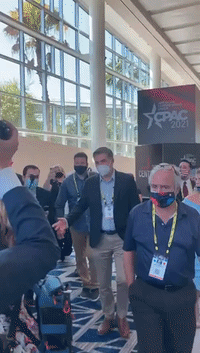Conservatives Challenge CNN Reporter Jim Acosta at CPAC in Orlando