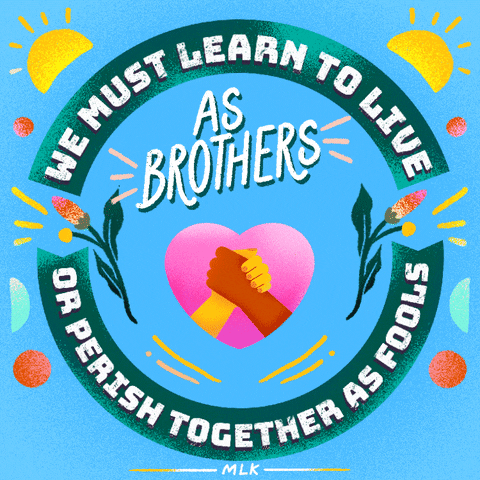 Digital art gif. Sunny graphic of a pink heart with a dark hand and a light hand in a G-lock handshake on a sky blue background, two floating banners circling it read, "We must learn to live, as brothers, or perish together as fools, MLK."