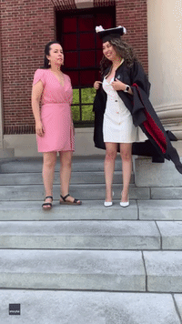 First-Generation Graduate Thanks Mother by Dressing Her in Cap and Gown at Harvard Ceremony