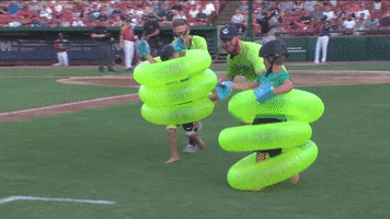 inner tube race face full of grass GIF by Kane County Cougars