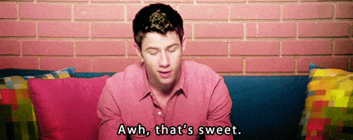 nick jonas aww GIF