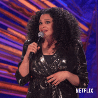 Michelle Buteau Shrug GIF by Netflix Is a Joke