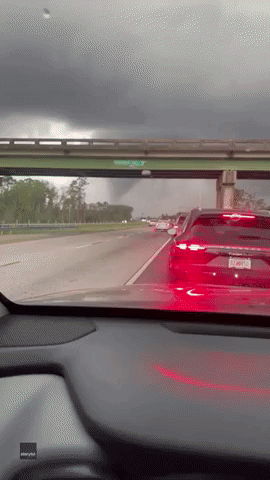 Funnel Cloud Spins Past Highway in Georgia