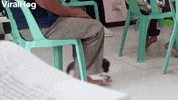 Guy In Church Swings Puppy With His Feet GIF by ViralHog