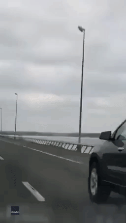 Strong Winds Cause Truck to Flip Over on Ohio Bridge