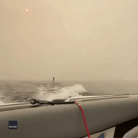 Man Rides Hydrofoil Surfboard Through Thick Smoke in British Columbia