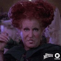 Movie gif. Bette Midler as Winifred from Hocus Pocus gives us a long, bored stare.