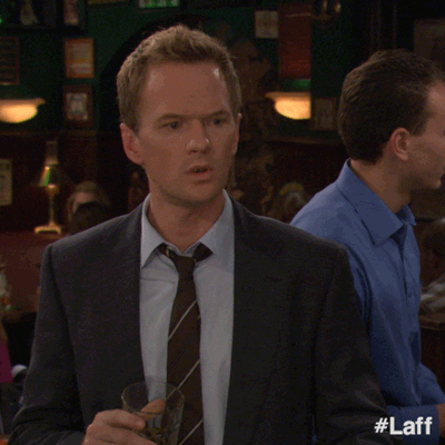 TV gif. Neil Patrick Harris as Barney Stinson on How I Met Your Mother stands looking both confused and concerned. He quickly raises his hand to interject and get a word in.