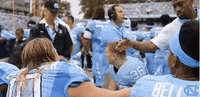 high five carolina football GIF by UNC Tar Heels