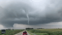 Destructive Tornado Whips Up Debris as It Travels Through Northern Illinois