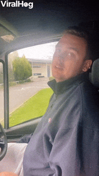 Man Exits Van and Slips