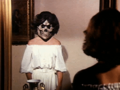 trashfiction giphyupload skull mirror GIF