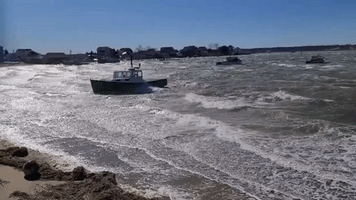 Boat Unmoored and Beached by Strong Winds in New Hampshire