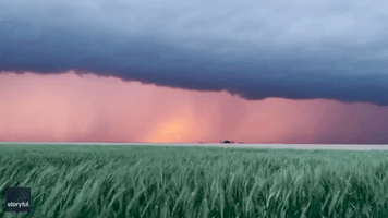 Lightning Flashes as Sun Sets in Kansas