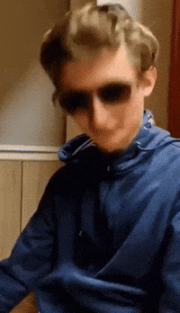 Suspicious Sunglasses GIF