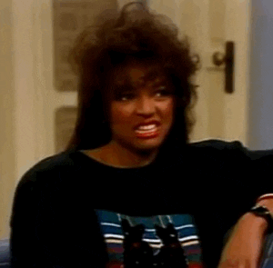 TV gif. Kim Fields as Tootie on The Facts of Life cringes in confusion and looks away.