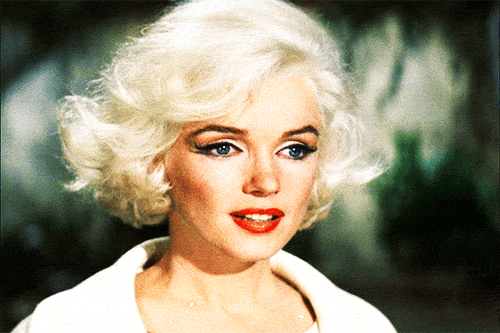Movie gif. Marilyn Monroe as Ellen in "Something's Got to Give," looks briefly exasperated and then rolls her eyes dramatically.