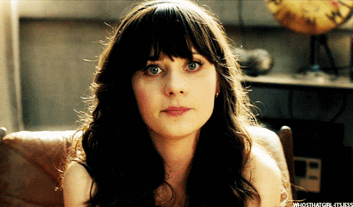 Movie gif. Zooey Deschanel as Summer in 500 Days of Summer sinks into a chair, pursing her lips into a line as if bored.