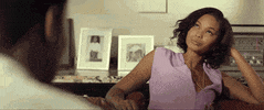 Movie gif. Chanel Iman as Lily in Dope rolls her eyes, chuckling and shaking her head.