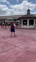 Disney Employee Attempts to Catch Snake