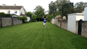 Supporter's Excitement Over Winning Game: Tipperary vs. Cork
