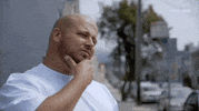 TV gif. Big Body Bes from F*CK THAT'S DELICIOUS listens to someone as he strokes his beard and nods with understanding.