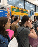 Crowd Protests Border Separations as Migrant Children Arrive at La Guardia Airport
