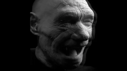 laughing neanderthal GIF