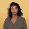 Celebrity gif. Hannah Bronfman smiles and raises two thumbs up with an enthusiastic “Yeah.”