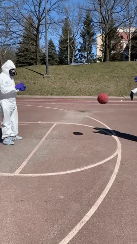Teens Wear Hazmat Suits For Basketball  Ball Game