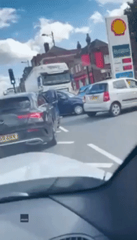 Man Kicks Car in Dispute at London Service Station Amid Fuel Crisis