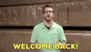 Ad gif. Max Glassburg leans forward with his hands out and smiles, saying, "Welcome back!" which appears as text.