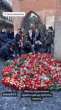 People Lay Flowers and Light Candles at Memorial for Victims of Prague Shooting