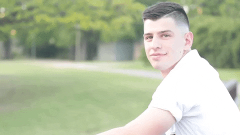 Wink Smile GIF by Texas A&M University