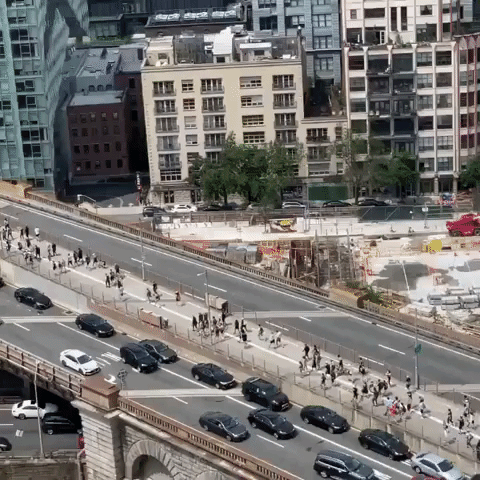 Long Line of Protesters Streams Across Brooklyn Bridge in New York