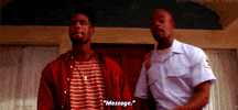 Movie gif. Shawn Wayans as Ashtray in Don't Be a Menace to South Central While Drinking Your Juice in the Hood stands on the porch of his house with a reflective stare. The Mailman leans in over his shoulder and looks at us. The mailman just says, “message” and leaves.