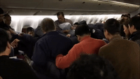 Police Officers Confront Unruly Passenger After United Airlines Denies Upgrade