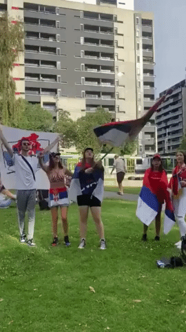 Djokovic Supporters in Serbian Colors Gather Outside Detention Hotel