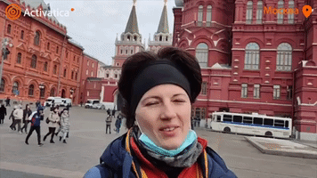 Woman Holding Sign in Moscow Dragged Away By Security Forces
