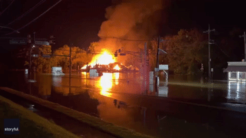 Fire Consumes Banquet Hall as Floodwaters Surround New Jersey Businesses