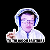 Photo gif. Man wearing headphones and glasses looks at us and points up and the photo shakes around. Text, "To the moon, brothers."
