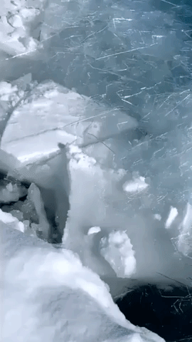 Ice on Lake Michigan Cracks Loudly as It Breaks Away From Shore