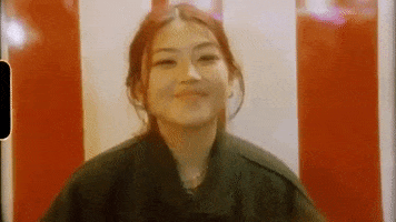 beabadoobee sad music video wink silly GIF