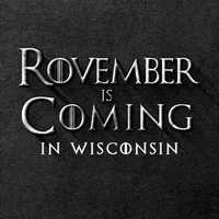 Text gif. In gray Game of Thrones font against a stony black background reads the message, “Rovember is Coming in Wisconsin.”