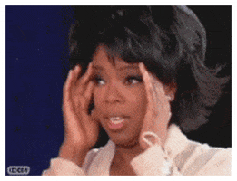 Celebrity gif. Oprah Winfrey has her hands on her temples with a shocked expression on her face. Her eyes dart around as she tries to figure out what’s going on. 